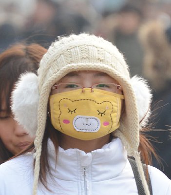 大気汚染深刻な北京ではマスク姿が目につく