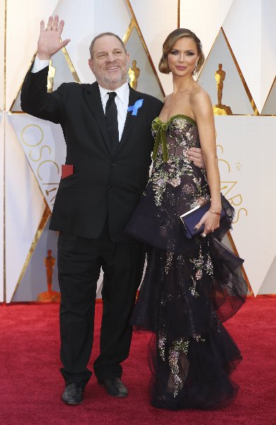 妻は離婚を表明（写真：Reuters/AFLO）