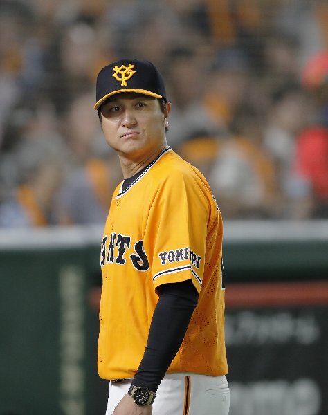 頼みは「カネ」？（写真：時事通信フォト）