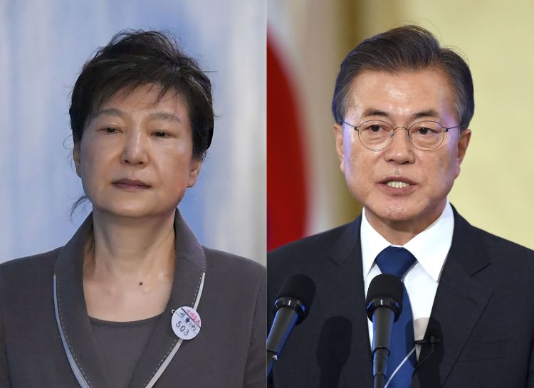 韓国で「親日派の娘」と非難された朴槿恵・前大統領と、「親日残滓の清算」を訴える文在寅・現大統領（AFP=時事）