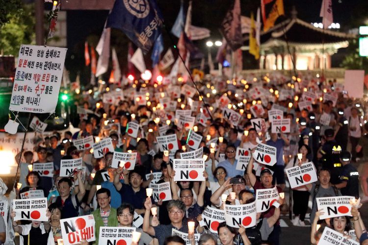 過去の日本への批判と現在の問題が混線している（EPA=時事）