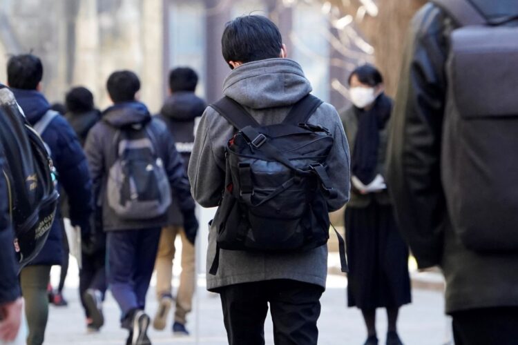 コロナ禍で行われた今年の大学入試（時事通信フォト）