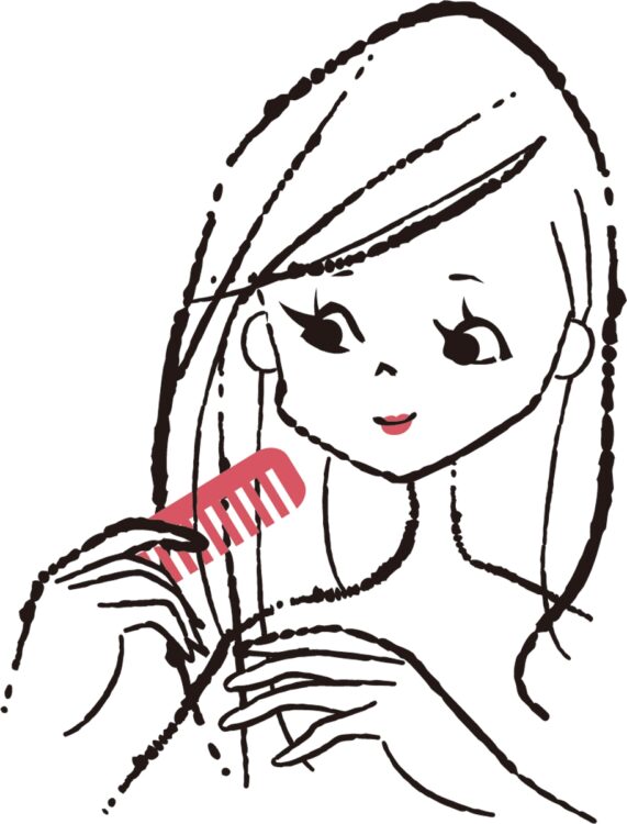 さらにくしでトリートメントを馴染ませる