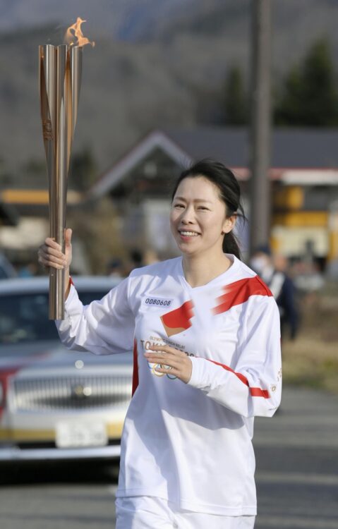 東京五輪での聖火ランナーの様子（写真／共同通信社）