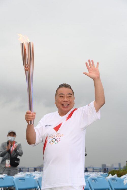 オリンピックでは聖火ランナーを務めた