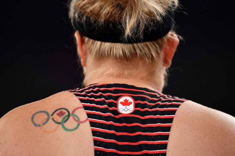 カナダ選手の五輪タトゥー。2021年開催の東京五輪では、ワンポイントの刺青を入れている選手が多くいた（AFP＝時事）