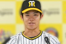 選手会長としてリーグ優勝に導いた中野拓夢（時事通信フォト）