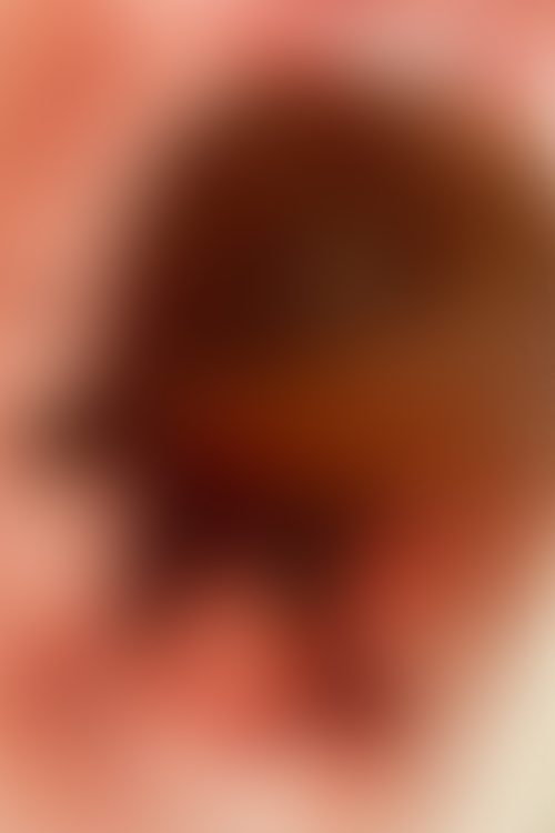 ナタのようなものでスッポンを串刺しにしていた写真（本人SNSより）