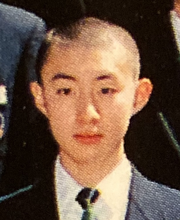 未成年者誘拐容疑で逮捕された栃木県小山市の伊藤仁士容疑者（３５歳）。中学校時代のアルバムより（時事通信フォト）