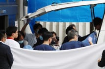 11月14日、青葉真司容疑者は京都市内の病院へ搬送された(時事通信フォト)